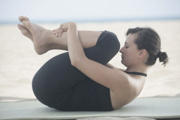 Apanasana - Knie-zum-Kinn-Position